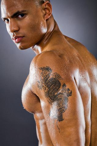 Dragon Tattoos Arm. dragon tattoo on his arm.