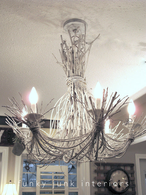 How to DIY a whimsical expensive looking (but FREE) white branch chandelier! It's gorgeous and easy to do! Click for full tutorial. #chandelier #branchchandelier #lighting #diy #rusticdecor