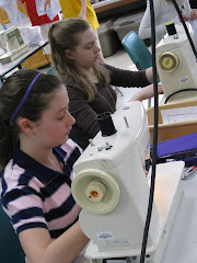 Kaira sewing her locker caddy