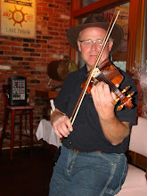 DAN PLAYS FIDDLE AT THE MILLI0NAIRE BALL ON MACKINAC ISLAND