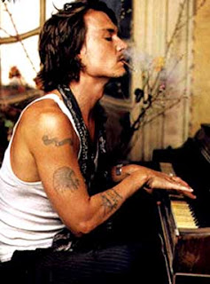 picture of Johnny depp arm tattoo