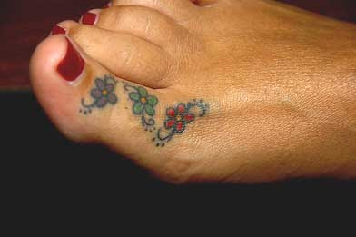 Toe flower and toe star tattoo designs