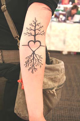 tree tattoo on ribs