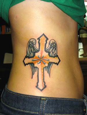 cross tattoo with wings