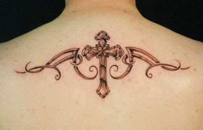 back side tribal cross tattoo