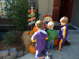 Boys Decorating Front Entrance for Fall