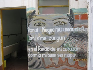 Mural comunitario Dia y noche (fishcug Menuco)