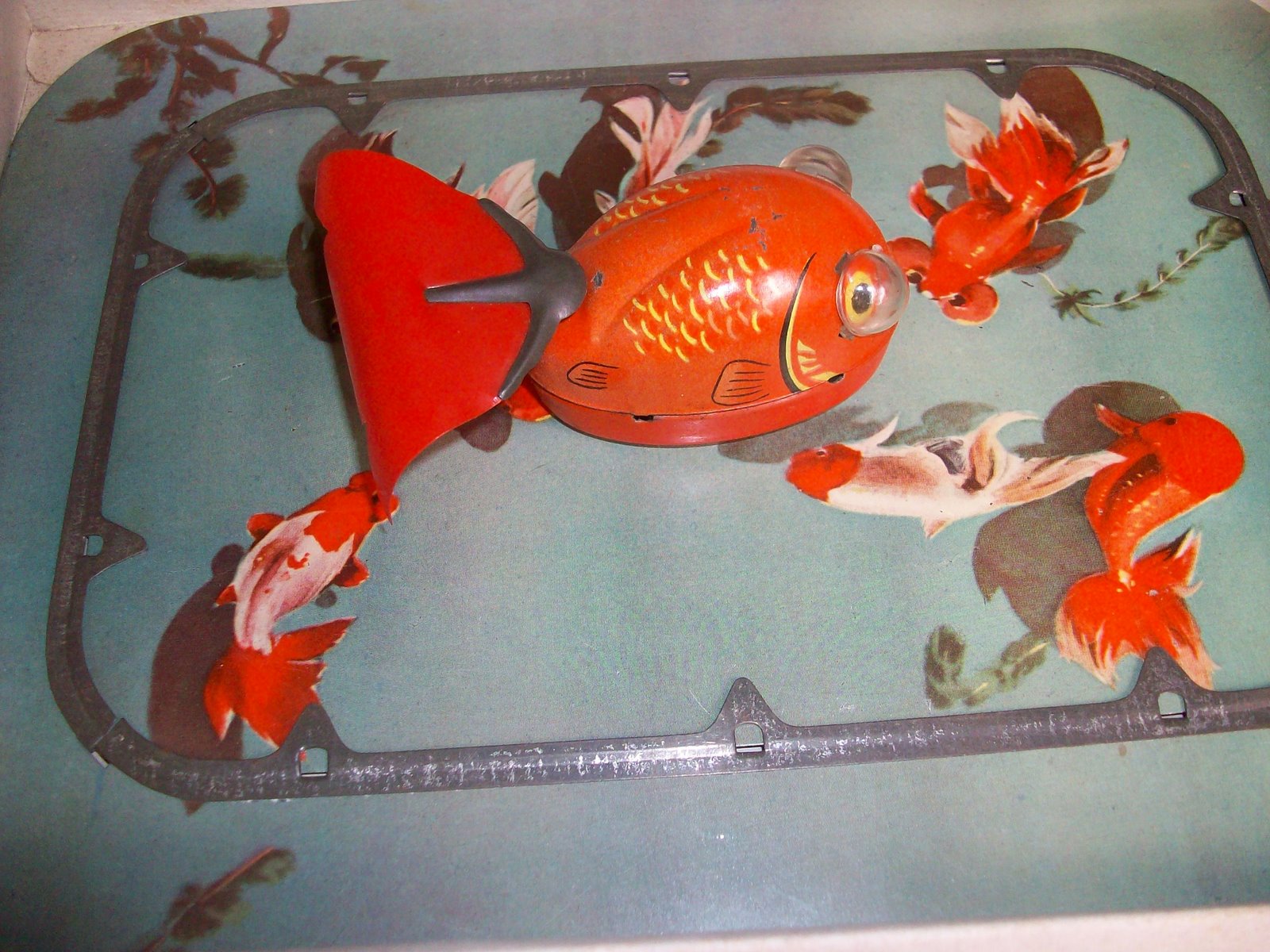 serba vintage golden fish tin toys