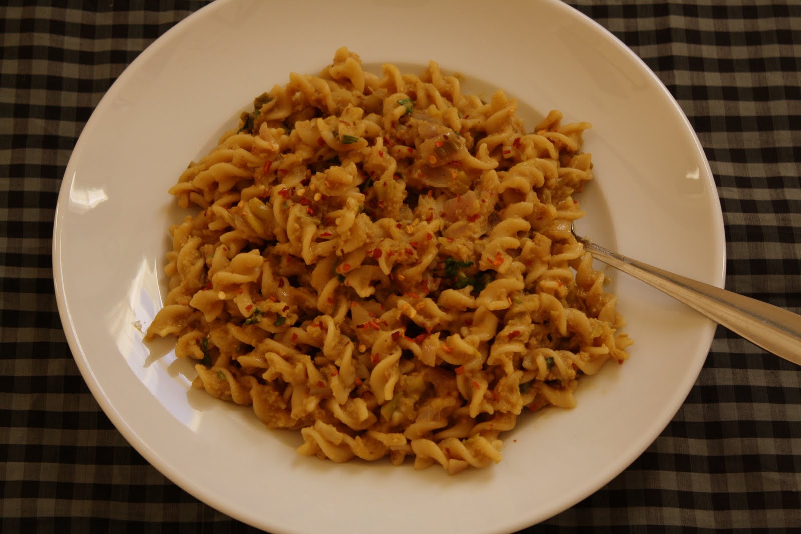 Versatile Vegetarian Kitchen Curried Pasta with Green Tomato Sauce (Vegan)