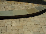 "Cobble" type paver with Bluestone circular step tread.