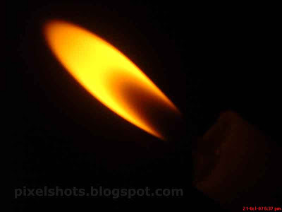 cute flames of candles, red yellow flames, swaying candle flame, dissolving candle flames, sweet candle photos, wax candle pics, flame and melting candle, colorless candle, burning candle, flame pics, macro mode candle flame photos