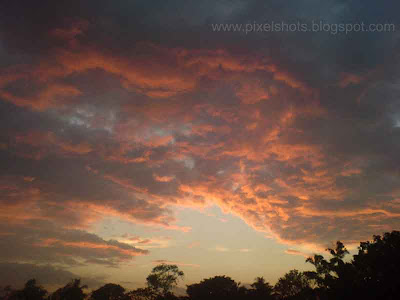 sunset afterglow on the clouds photographs making the clouds glow red