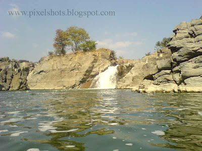 small waterfalls in hoganekkal taken during basket boat journey through river kauvery