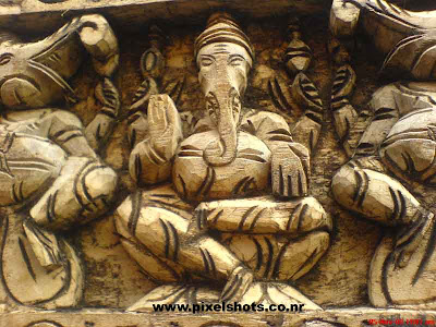 ganesha hindu god carved in wood for sale in the shops of mattancherry town jew street cochin kerala