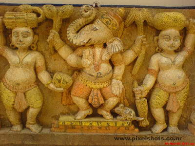 hindu god lord ganesha clay sculpture,ganesha and his fellows sculptured in clay photograph