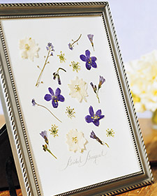 Pressed Flowers in Picture Frame via Martha Stewart Weddings