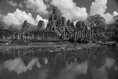 Bayon temple at Angkor Wat over the lake B&W shot