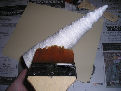 Paint outside of yarn with glue to glitter yarn trees