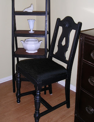 Black Chair reuphostered with baby blakets