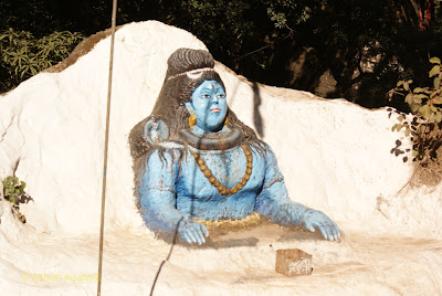 Portrait of Lord Shiva on a rock at Jata Shankar in Pachmarhi