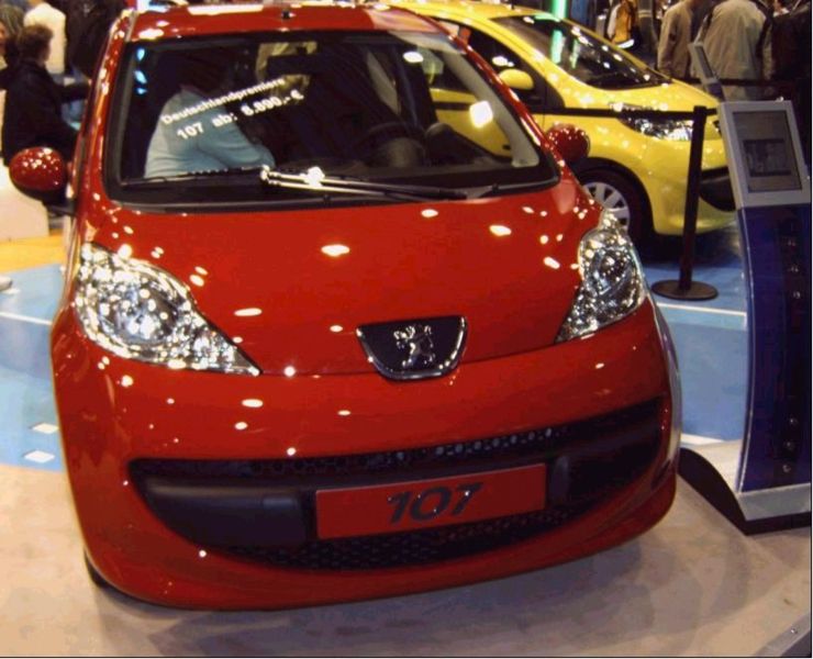 [740px-Peugeot_107_red_front.jpg]