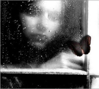 GirlInWindowRainResized.jpg