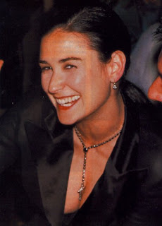 Ladies in Satin Blouses: Demi Moore - various suits