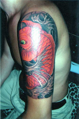 Arm Tattoo - Red Fish Designs