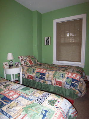 green bedroom twin beds