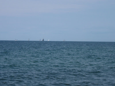 Water with boats on horizon