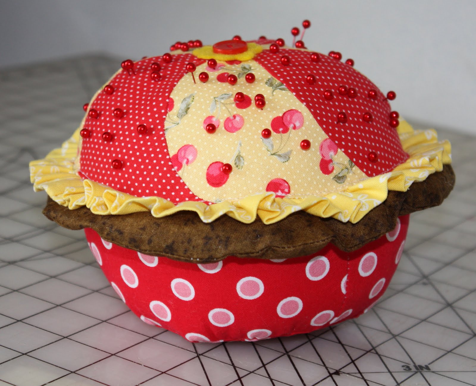 Thimbles, Bobbins, Paper and Ink A cheery cherry cupcake pincushion