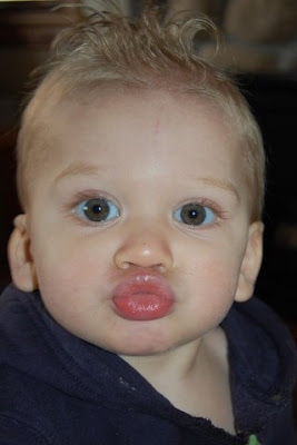 The Phillips Family: Tyson's kissing face...he is so funny!
