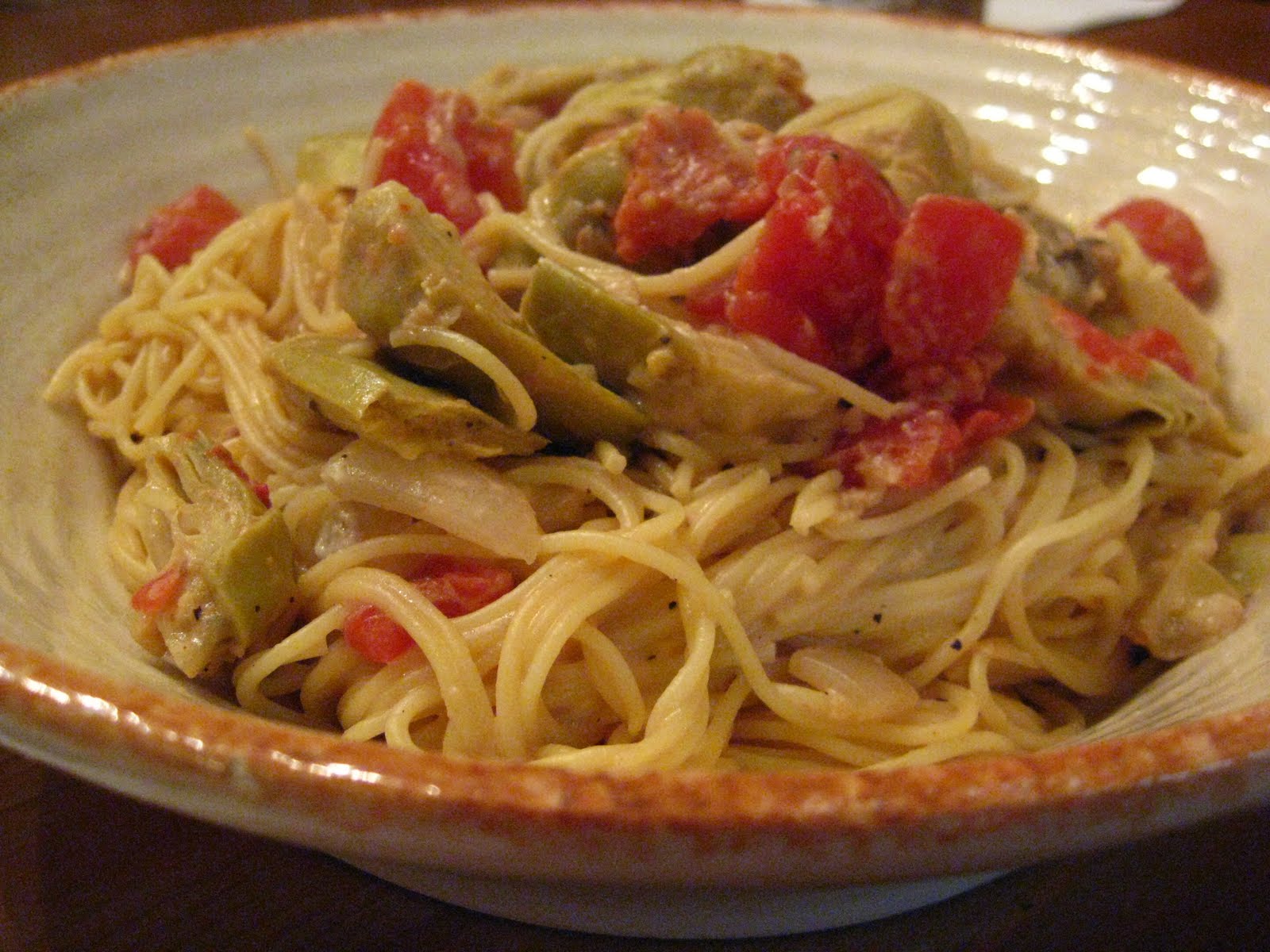 A Taste of Home Cooking Spaghetti with Artichoke Hearts and Tomatoes