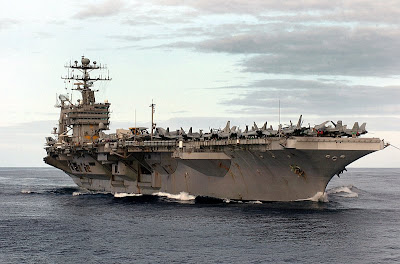 The Nimitz-class aircraft carrier USS John C. Stennis (CVN-74) cruises through the calm waters of the Pacific Ocean, October 19, 2004. John C. Stennis and embarked Carrier Air Wing Fourteen (CVW-14) were on a scheduled deployment to the Western Pacific Ocean. U.S. Navy photo by Photographer's Mate Airman Charlie Whetstine