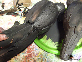 black feathered Halloween raven sculptures