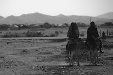 Women collecting grass