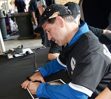 NASA astronaut Dr. John Grunsfeld signs autographs at the White Sox game during the 2009 Hometown Heroes campaign in Chicago.