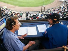 NASA astronaut Dr. John Grunsfeld talks with broadcaster Ed Farmer at the White Sox game during the 2009 Hometown Heroes campaign in Chicago