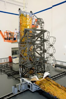 These Webb telescope simulators are full-scale representations of the optical telescope element and sunshield