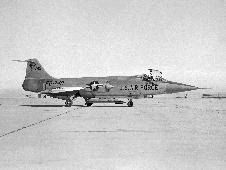 JF-104A #56-0749 on the ramp at NASA's Flight Research Center on Edwards Air Force Base in 1959 with the Air Launched Sounding Rocket (ALSOR) attached to its underbelly. NASA test pilot Milton O