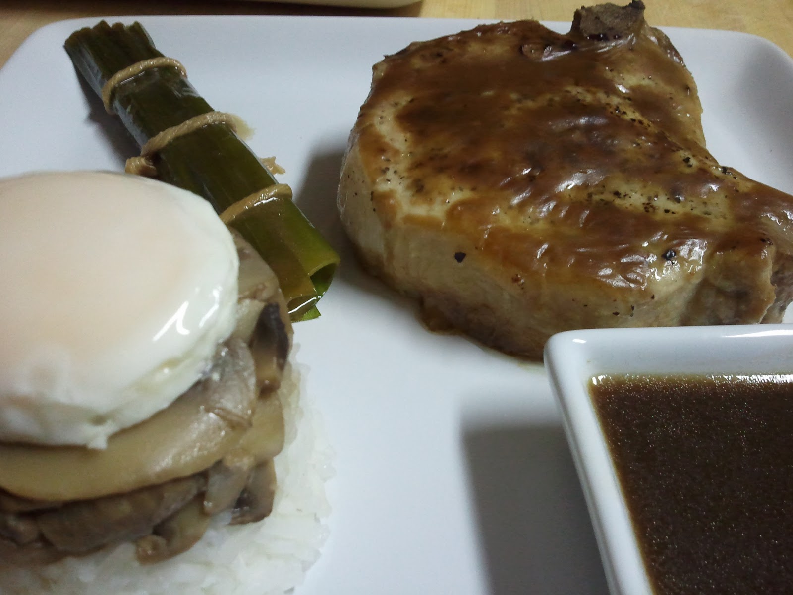 Bistro 331 DemiGlace Pork Chop with a Napoleon of Egg, Mushroom, and Rice