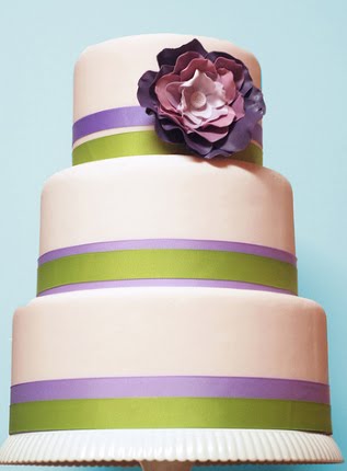 Wedding Cake 2 Simple and elegant three tier white round cake with purple