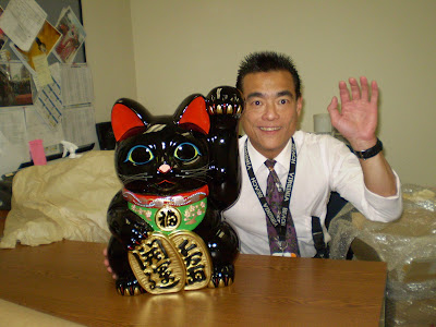 Maneki neko and one happy owner