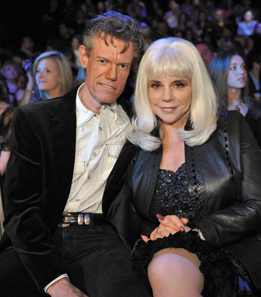 tabloid baby Randy Travis divorces his old lady