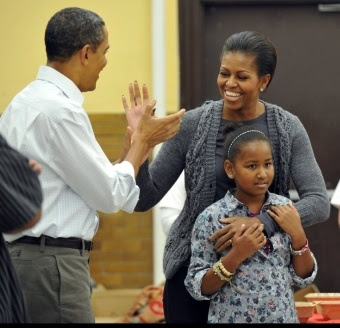 President Obama and the First Lady Michelle Obama playing around. We ...