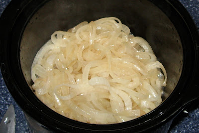 onions cooking in crock pot