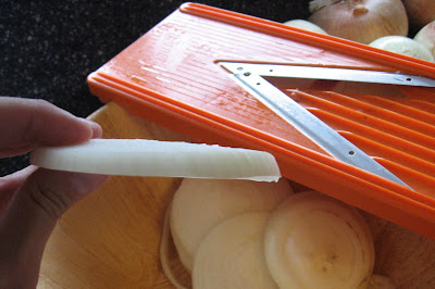 slice of onion from mandolin slicer