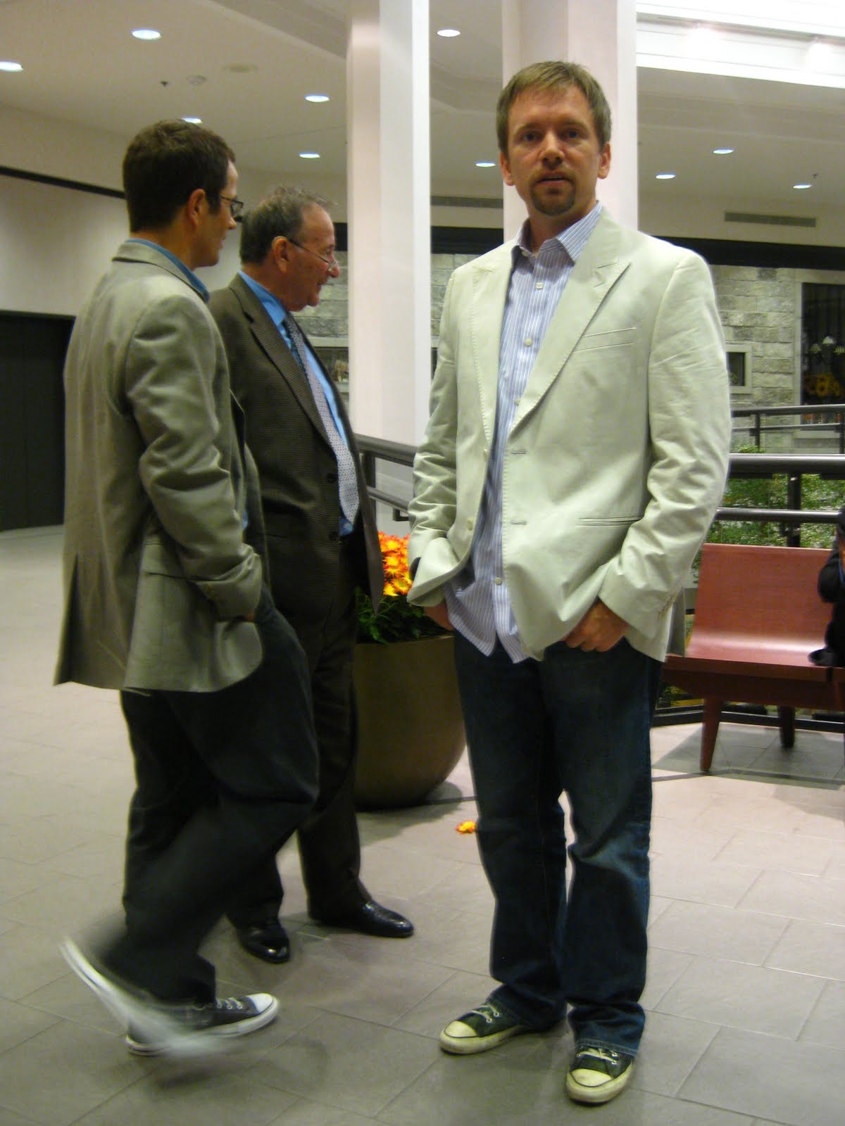 relaxes as tattoo artist