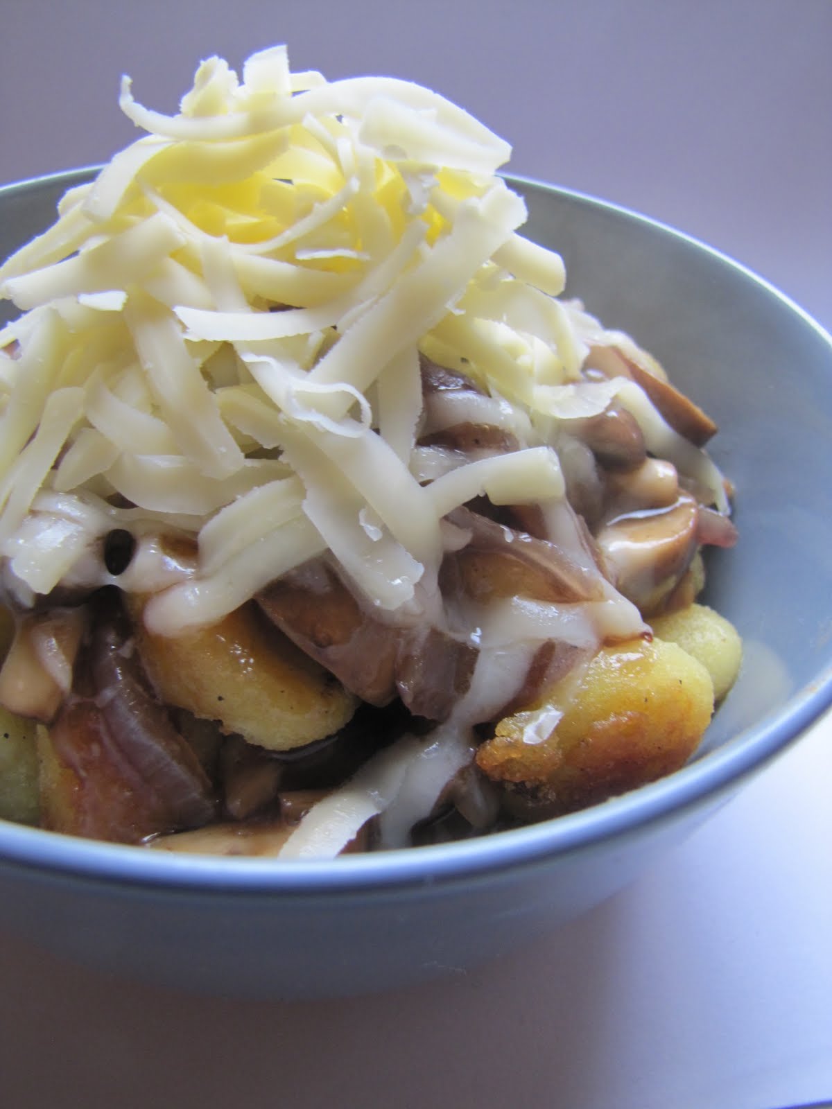 Dipa's Daily Dumplings Crispy Gnocchi With Mushroom Gravy and Cheddar