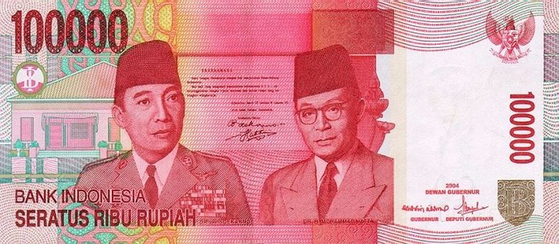 Membedakan uang asli dan palsu